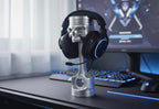 Skull piston headphone stand with gaming headset on a blue RGB lit gaming desk