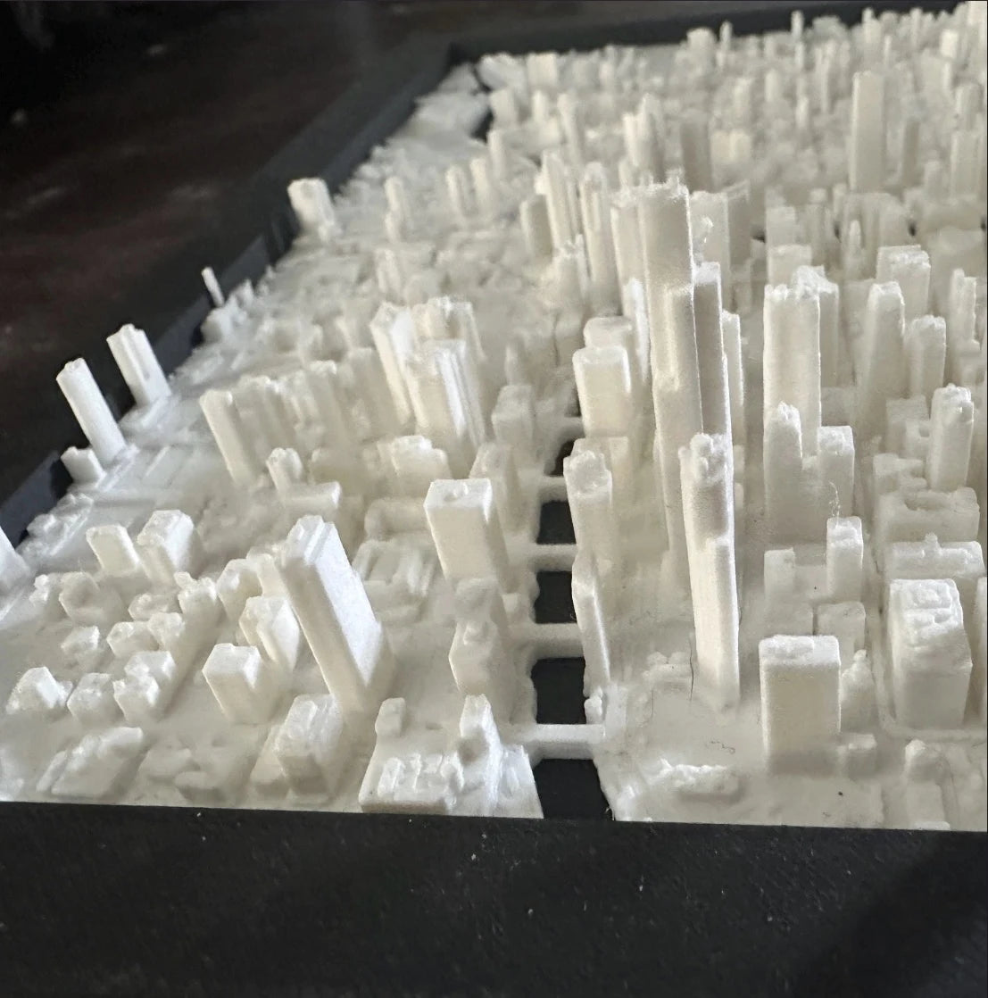 Close detail of layered architecture and sculpted city streets